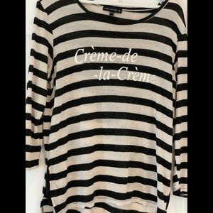 Black and cream sweater. Light and earthy